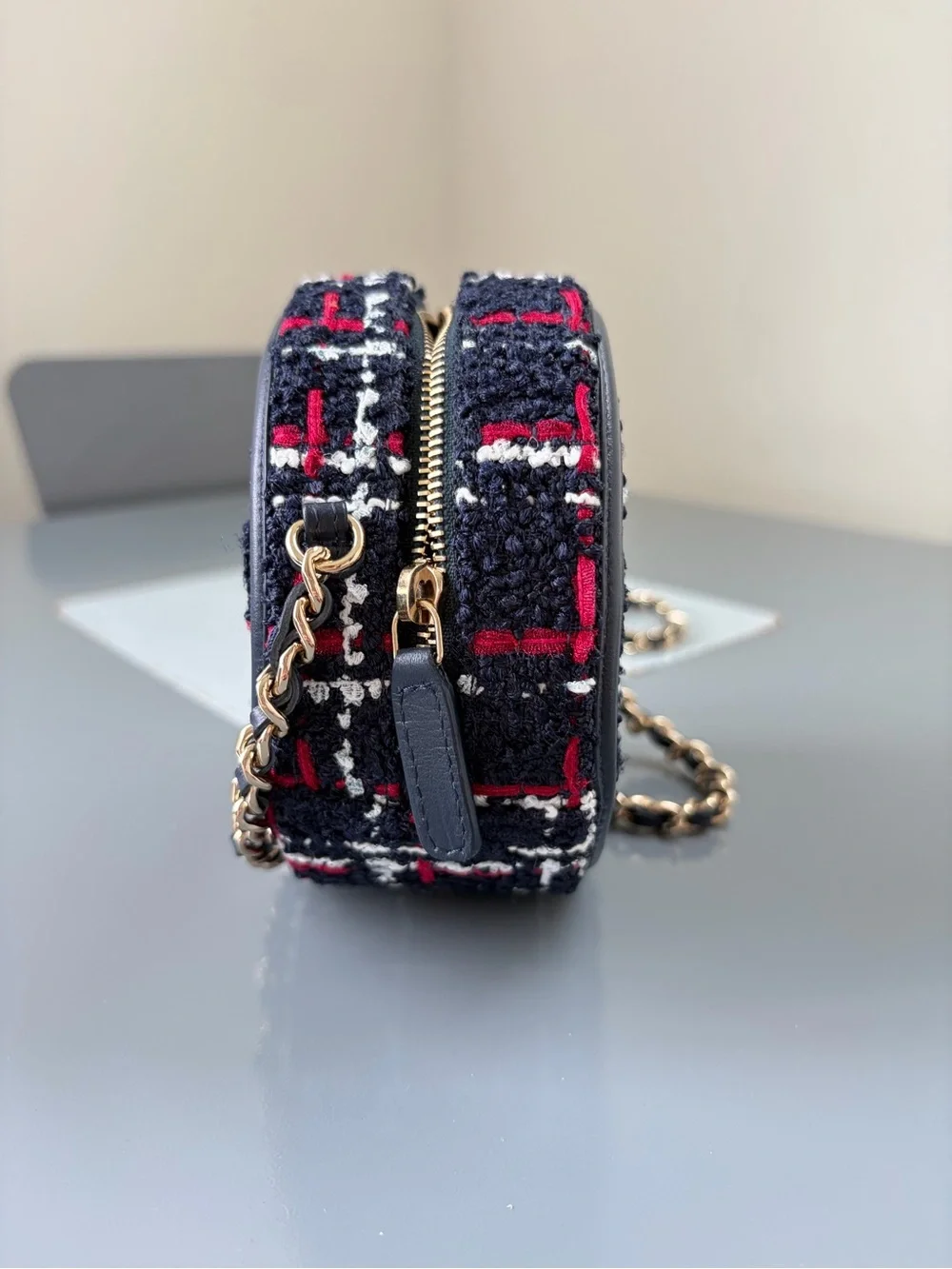 CHANEL Black Tweed Round Shoulder Bag with Red & White Accents